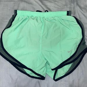 Mint green Nike running shorts